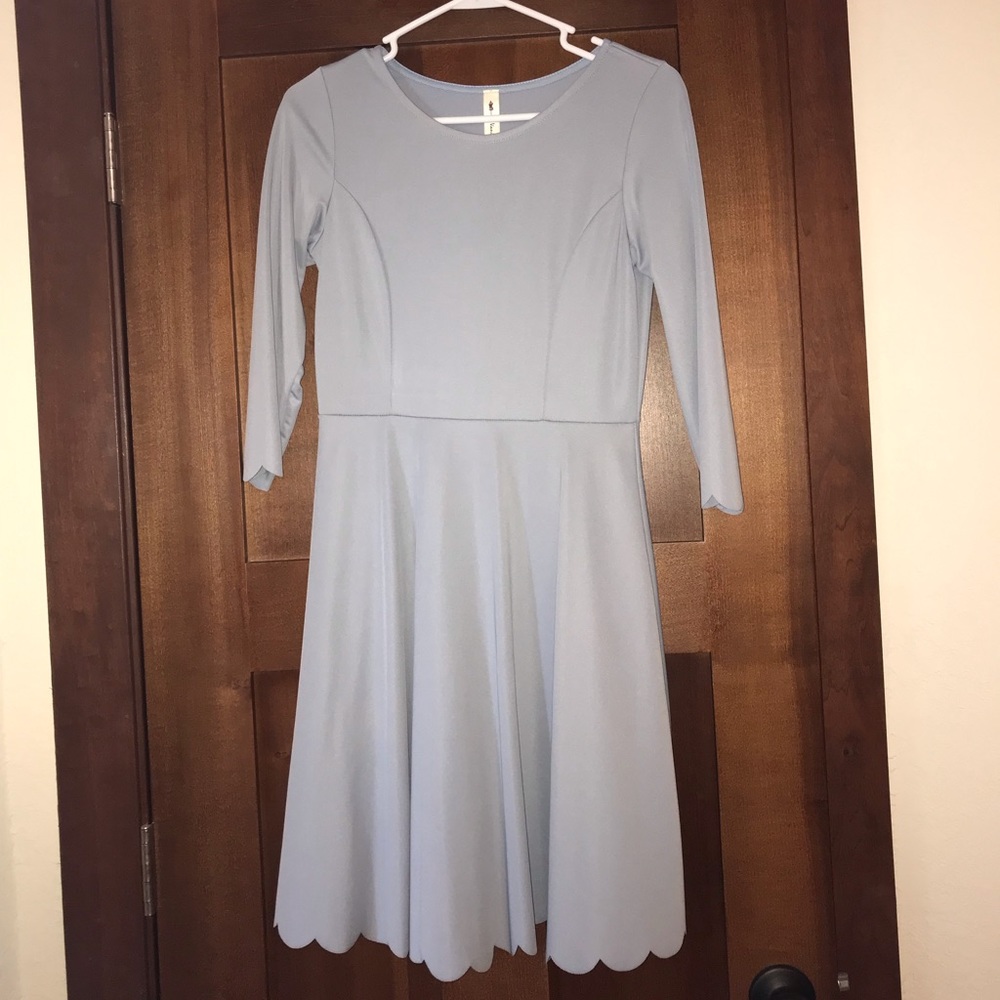 Steel blue elbow length sleeved mini dress. Size small.